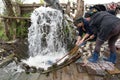 Traditional carpet washing in Maramures county , Romania