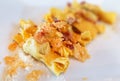 Traditional Casoncelli alla Bergamasca on the plate. Traditional stuffed pasta from the Northern Italian town of Bergamo