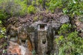 Traditional cave graves carved in the rock at Lemo. Tana Toraja, South Sulawesi, Indonesia Royalty Free Stock Photo