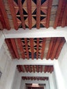 Traditional ceiling made of palm tree tranks and branches of Nerium oleander