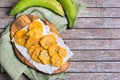 Fried tostones, green plantains, bananas with guacamole sauce