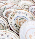 Traditional ceramic plates exposed to a fair