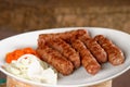 Traditional cevapcici with ajvar paste Royalty Free Stock Photo