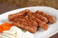 Traditional cevapcici with ajvar paste Royalty Free Stock Photo