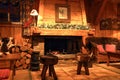 Traditional chalet living room with a wood burning fireplace