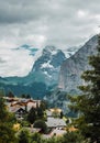 Traditional chalet in Swiss Alps. Switzerland, Jungfrau. Cozy small village Murren in mountains. Beautiful landscape Royalty Free Stock Photo