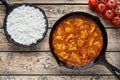 Traditional chicken tikka masala Indian spicy meat food with rice