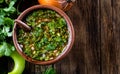 Traditional Chilean spicy sauce Pebre with chili, onion, coriandes Royalty Free Stock Photo