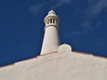 Traditional chimney on a roof with blue sky