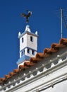 Traditional chimney in the shape of the Torre of Belem on a housetop