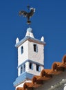 Traditional chimney in the shape of the Torre of Belem on a housetop