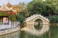 Traditional chinese arch bridge in Renmin park in Tianjin Royalty Free Stock Photo