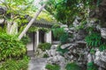 Traditional Chinese architecture between trees at Lingering Garden Scenic Area, Suzhou, Jiangsu, China Royalty Free Stock Photo