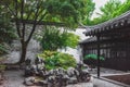 Traditional Chinese architecture between trees at Lingering Garden Scenic Area, Suzhou, Jiangsu, China Royalty Free Stock Photo
