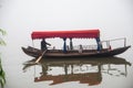 Traditional chinese boat view in Wuhan city Donghu east lake during rainy season