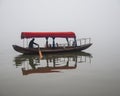 Traditional chinese boat view in Wuhan city Donghu east lake during rainy season