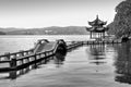 Traditional chinese bridge and pavilion on Hangzhou lake, China, Black and white