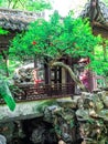 Traditional chinese building with ornate roof and red windows at Yu Gardens, Shanghai, China Royalty Free Stock Photo