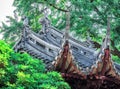 Traditional chinese building with ornate roof and red windows at Yu Gardens, Shanghai, China Royalty Free Stock Photo