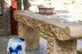 A traditional Chinese carved stone desk and blue and white porcelain stool Royalty Free Stock Photo