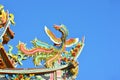 Traditional Chinese Ceramic bird sculpture on temple roof Royalty Free Stock Photo