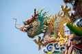 Traditional Chinese Ceramic Dragon sculpture on Roof Shrine Royalty Free Stock Photo