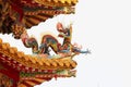 Traditional Chinese Ceramic dragon sculpture on temple roof Royalty Free Stock Photo