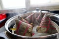 Traditional chinese dessert made with white rice and bamboo leafs Royalty Free Stock Photo