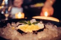 Traditional Chinese dessert tang yuan with rice ball served in coconut and pineapple on ice. Royalty Free Stock Photo