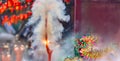 Traditional Chinese firecrackers are exploding with flashes and smoke in Lunar new year Royalty Free Stock Photo