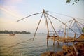 Traditional Chinese fishing nets at sunset, Cochin, India. Royalty Free Stock Photo