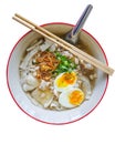 Isolated chinese food in thailand by top view, Local white noodle in chicken soup  with topping of pressed pork boiled egg Royalty Free Stock Photo