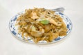 Traditional Chinese fried rice nood with chicken, spring oion and bean sprout