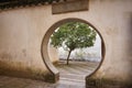 Traditional Chinese garden with round entrance