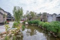 Traditional Chinese garden, a tourist attraction at Wolong College in Changting city, with ancient wood buildings, stones, and sma