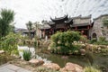 Traditional Chinese garden, a tourist attraction at Wolong College in Changting city, with ancient wood buildings, stones, and sma