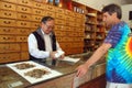 Traditional Chinese herbalist prepares herbs for customer Chinatown, Oakland, CA Royalty Free Stock Photo