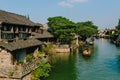 Traditional Chinese houses by water with boats, in the old town of Wuzhen, China Royalty Free Stock Photo