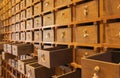 Traditional chinese pharmacy shop. Ancient herbs pharmacy cabinet wooden drawers in background Royalty Free Stock Photo