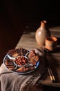 Traditional Chinese preserved sausage and pork, cut in slices in an antique plate