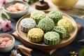 Traditional Chinese skin mooncakes for mid autumn festival with fruit, taro and matcha paste