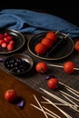 Traditional chinese snack called Tanghulu meaning crispy sugar-coated fruits,tomato,strawberry,blueberry,pear and usually shows on Royalty Free Stock Photo