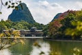 Traditional Chinese style bridge over a lake in Chinese garden park Royalty Free Stock Photo