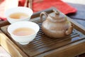 Traditional chinese tea ceremony accessories (tea pot and cups w Royalty Free Stock Photo