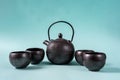 Traditional Chinese teapot for brewing green tea and tea cups Royalty Free Stock Photo