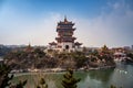 Traditional Chinese temple on the island in Penglai pavilion, Yantai, Shandong, China. Blue sky with copy space, wallpaper