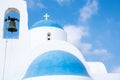 Traditional christian church with belfry dome against blue cloudy sky