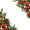 Traditional Christmas Border with Baubles and Winter Greenery Royalty Free Stock Photo