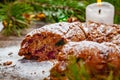 Traditional Christmas cake with dried fruits, raisins and nuts on wooden background. Royalty Free Stock Photo