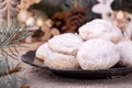 Traditional Christmas cookies biscuits snowballs covered icing sugar povder with almond nut, nutella chocolate an raspberry jam.